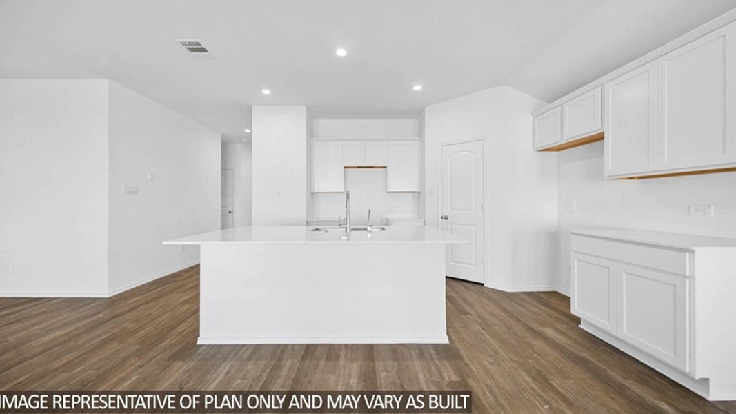 Furnished interior view inside a new home in Sunterra, Katy (Image 4).