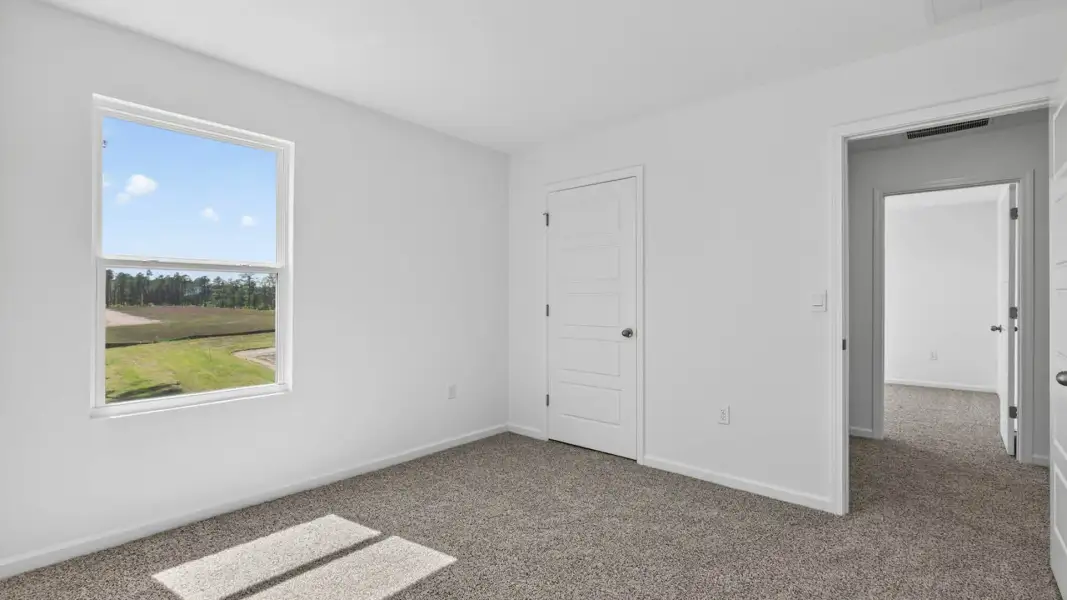Spacious, unfurnished interior of a new home in The Arbors, Jacksonville (Image 24).
