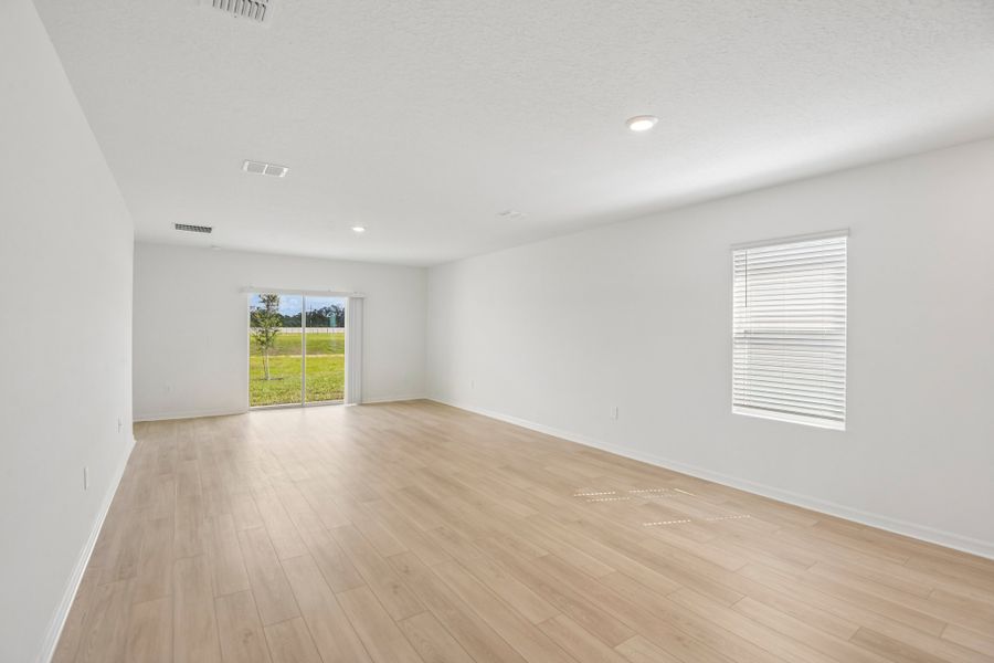 Representative unfurnished interior of a home built from the Blackbird by Taylor Morrison in Westview Community Group Page, Kissimmee (Image 8).
