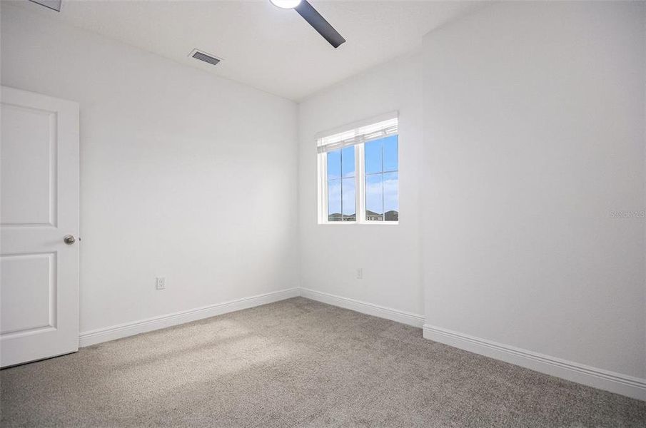 Spacious, unfurnished interior of a new home in Hills of Minneola, Minneola (Image 39).