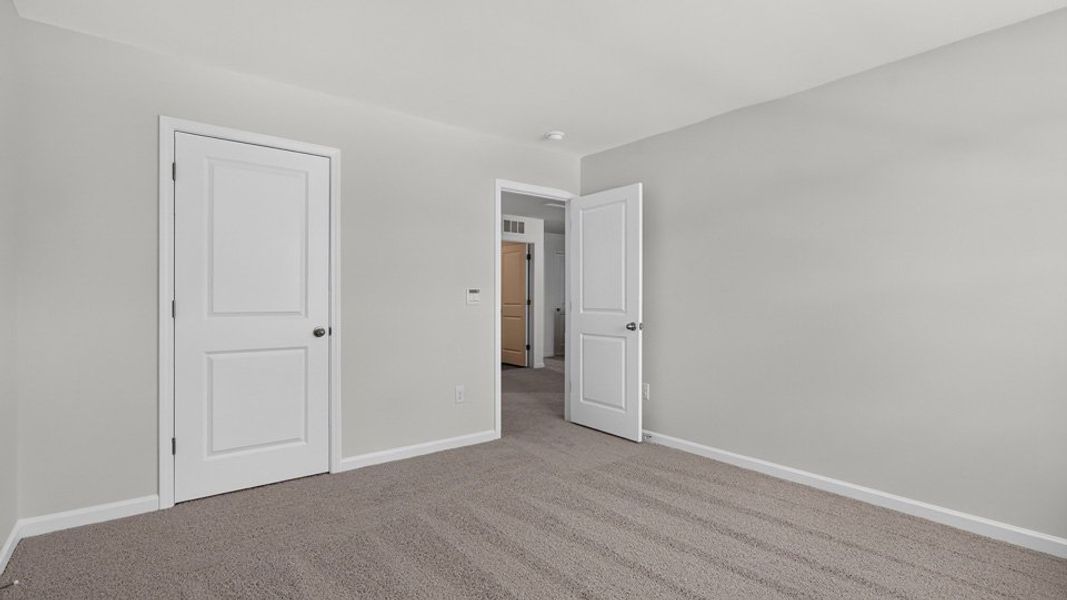 Spacious, unfurnished interior of a new home in The Reserve at Prestleigh, Wake Forest (Image 26).