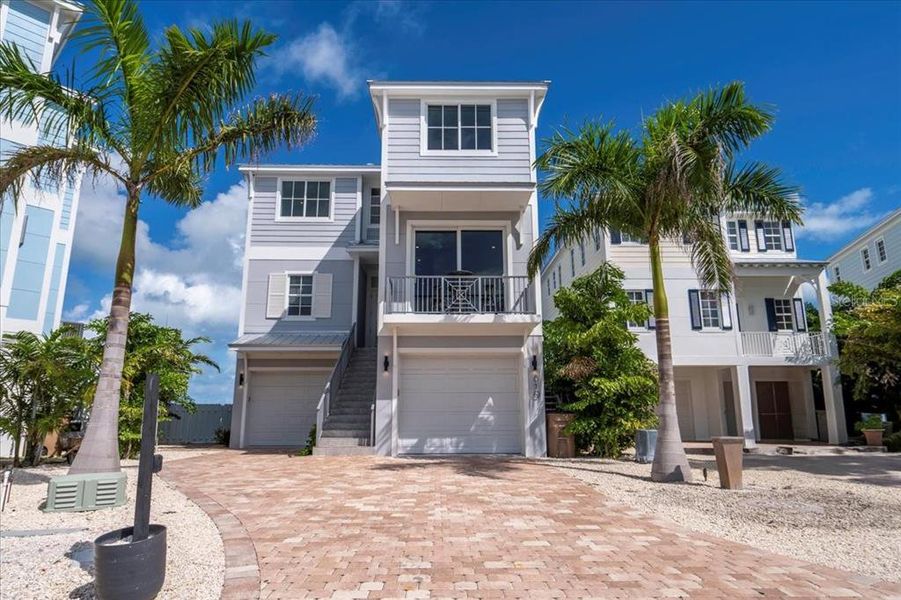Front exterior of a new home in , Marathon, FL, highlighting curb appeal (Image 2). Front exterior of a new home in , Marathon, FL, highlighting curb appeal (Image 2).