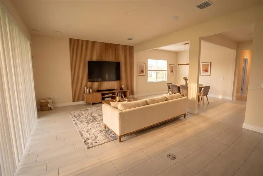 Furnished interior view inside a new home in Parkview Reserve, Orlando (Image 13).