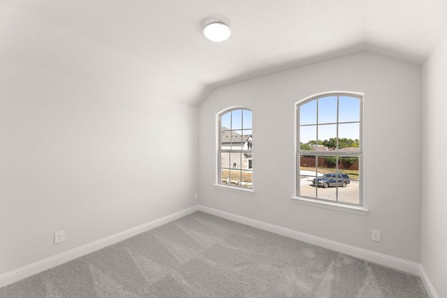 Front exterior of a new home in Main Street Village, Mansfield, TX, highlighting curb appeal (Image 23). Front exterior of a new home in Main Street Village, Mansfield, TX, highlighting curb appeal (Image 23).