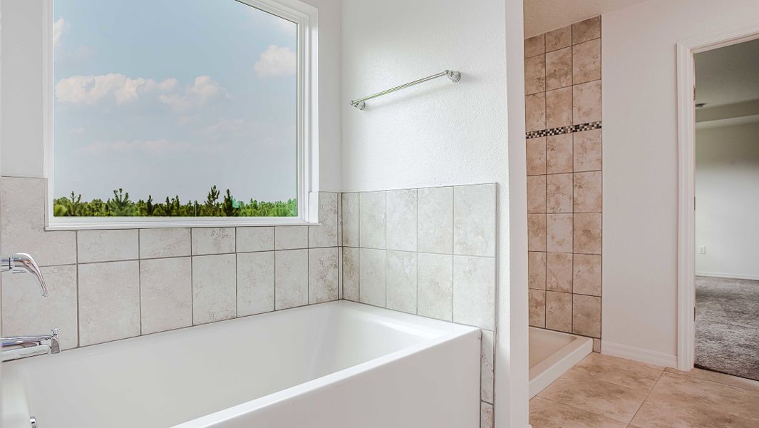 Furnished interior view inside a new home in Enclave At Seminole Palms, Palm Coast (Image 44). Furnished interior view inside a new home in Enclave At Seminole Palms, Palm Coast (Image 44).