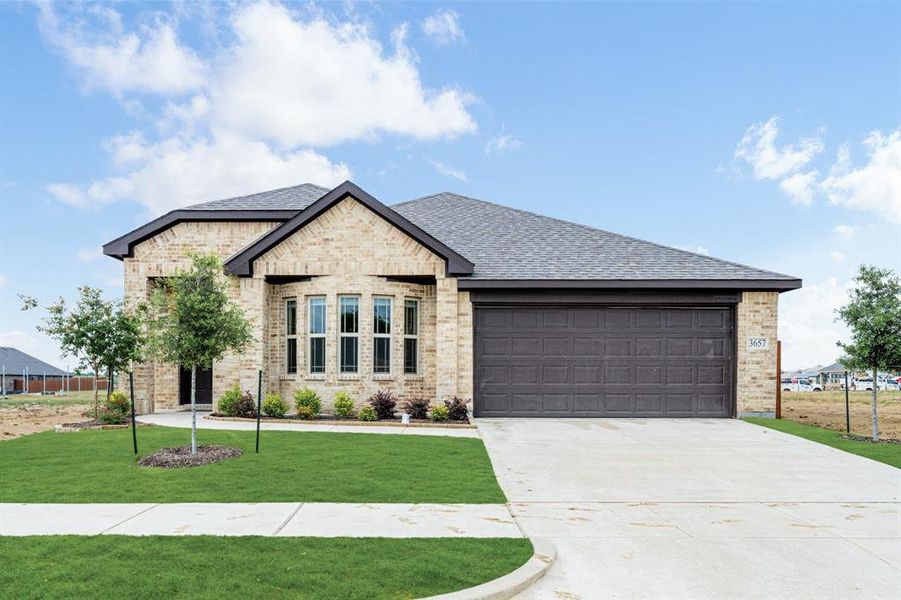 Front exterior of a new home in Georgetown at Kings Fort, Kaufman, TX, highlighting curb appeal (Image 2).