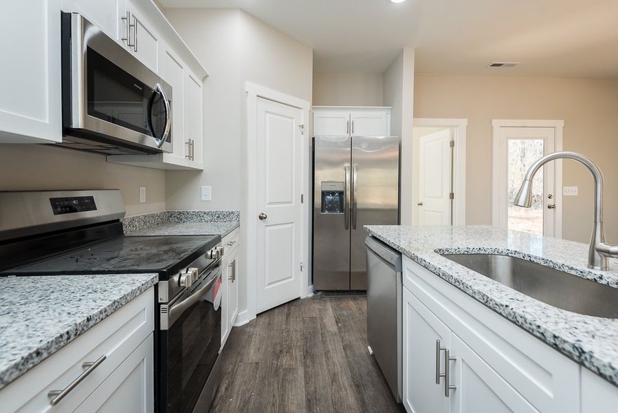 Representative furnished interior of a home built from the Adams by Foundation Home Builders LLC in Pallini Place, Ossipee (Image 6).