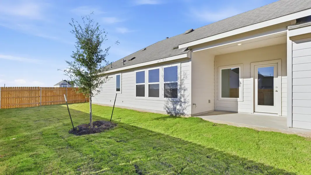 Exterior details and patio area of a home in Creeks Crossing, Elgin (Image 3).
