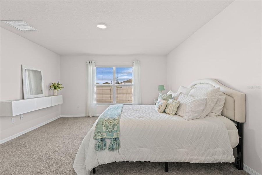 Furnished interior view inside a new home in Silverstone North, Palmetto (Image 16).