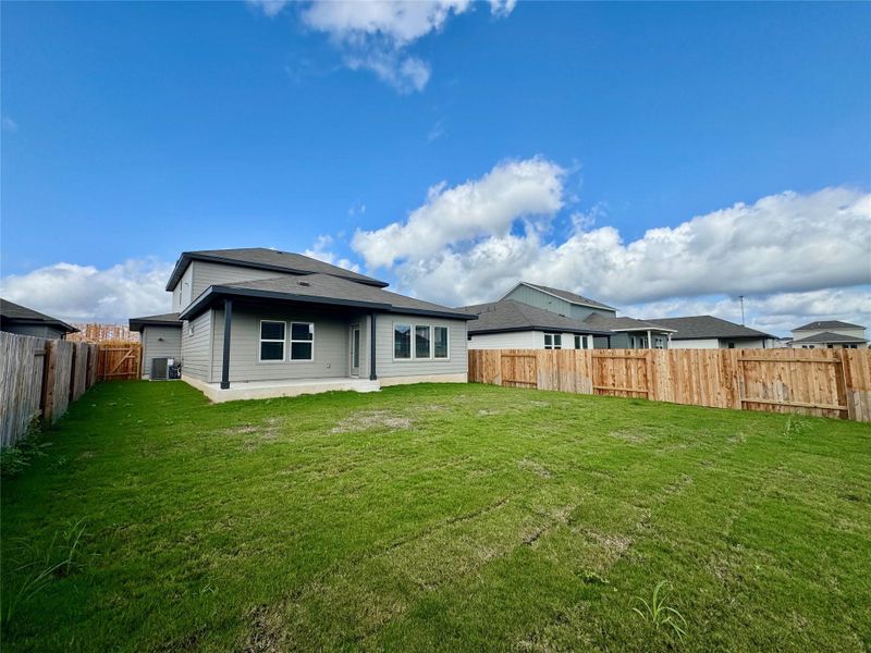 Exterior details and patio area of a home in Waterstone Crossing, Kyle (Image 2). Exterior details and patio area of a home in Waterstone Crossing, Kyle (Image 2).