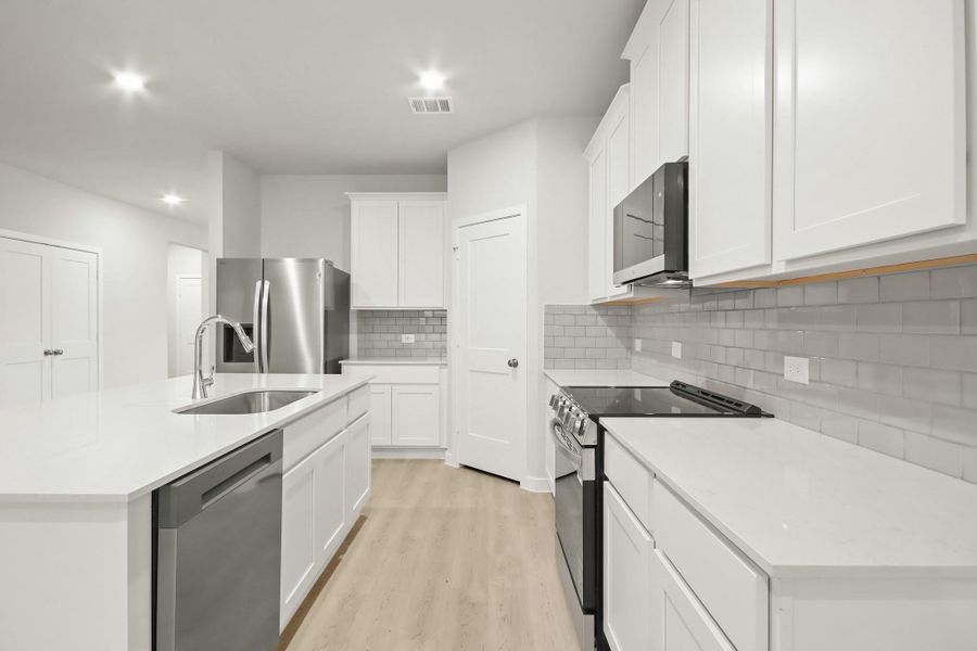 Furnished interior view inside a new home in Oakwood Ranch, Willis (Image 5).