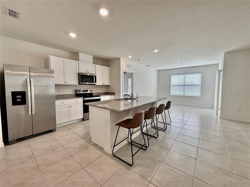 Furnished interior view inside a new home in Eden Hills, Lake Alfred (Image 4).