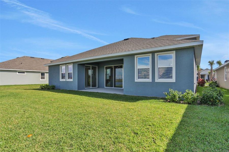 Exterior details and patio area of a home in Seaire, Parrish (Image 4).