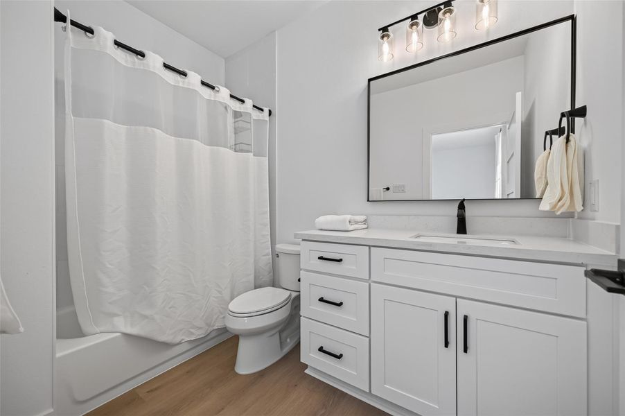 Furnished interior view inside a new home in , Conroe (Image 40).