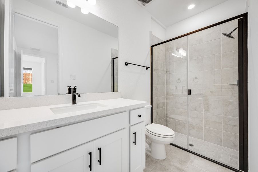 Representative furnished interior of a home built from the Sapphire by Taylor Morrison in Highland Lakes 60s, McKinney (Image 9).