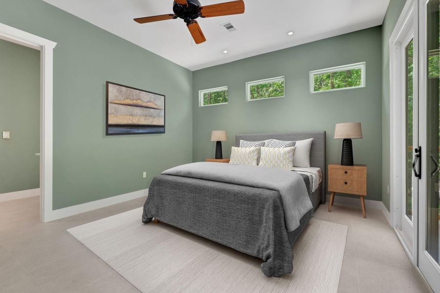 The primary suite is on one side of the home - Virtually staged