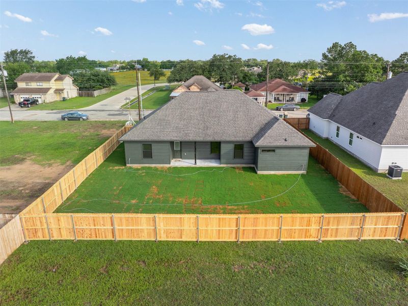 A new construction residence with ample yard space awaits your personal touches. A new construction residence with ample yard space awaits your personal touches.