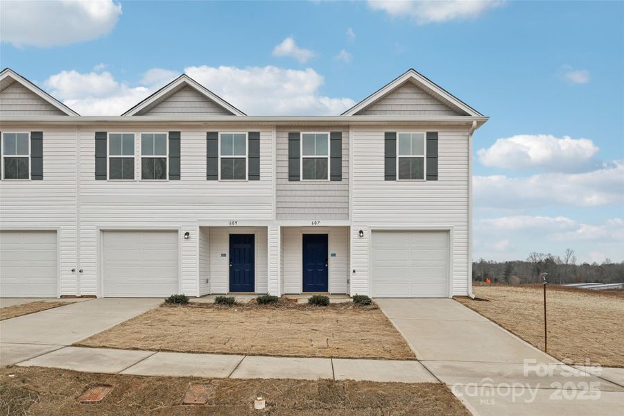 Front exterior of a new home in The Towns at Green Needles, Lexington, NC, highlighting curb appeal (Image 7).