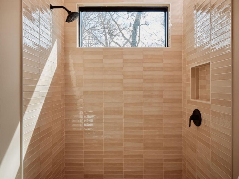 Bathroom view of tiled shower