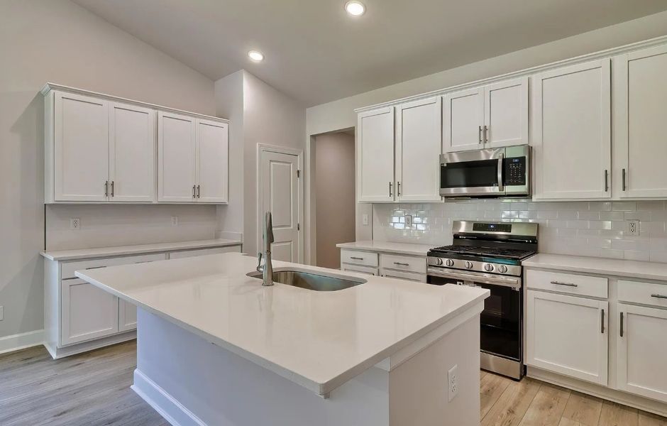 Furnished interior view inside a new home in Satchel Ford, Columbia (Image 6).