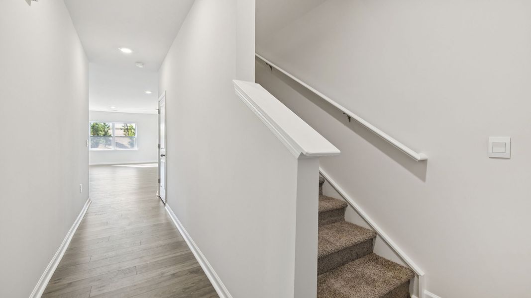 Spacious, unfurnished interior of a new home in Tanglewood Townes, Greenville (Image 15).