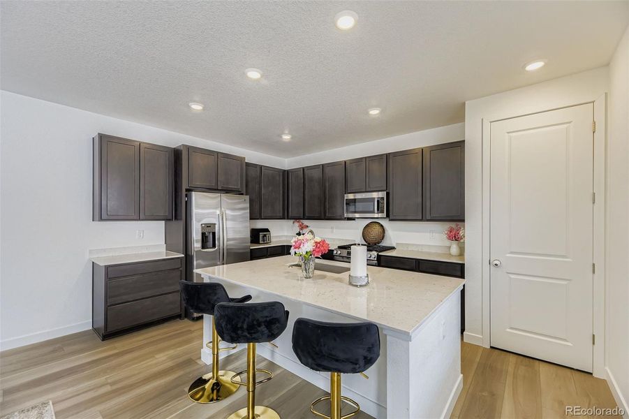 Furnished interior view inside a new home in Newlin Crossing, Parker (Image 19).