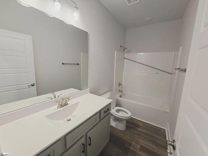 Furnished interior view inside a new home in Hidden Lake Estates, Greenville (Image 5).