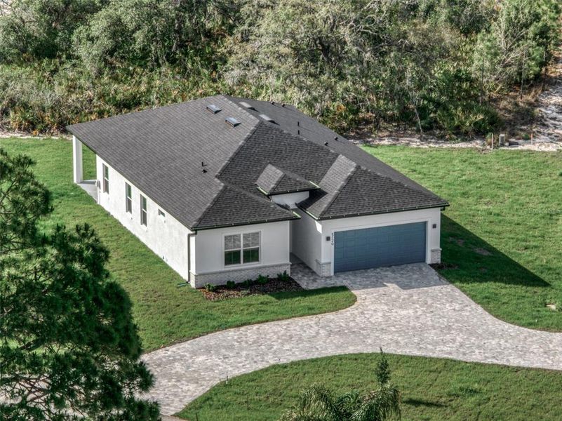 Front exterior of a new home in , Sebring, FL, highlighting curb appeal (Image 1). Front exterior of a new home in , Sebring, FL, highlighting curb appeal (Image 1).