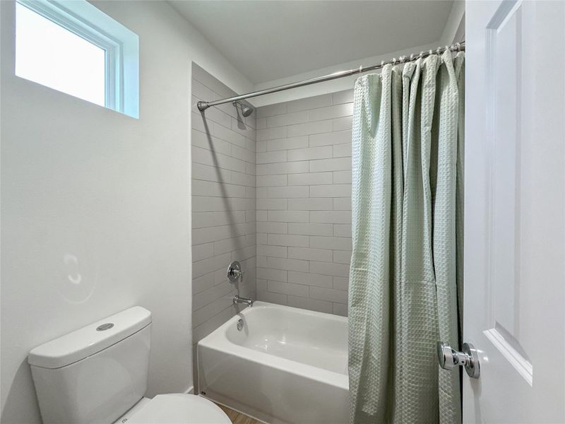 Furnished interior view inside a new home in , Conroe (Image 36).