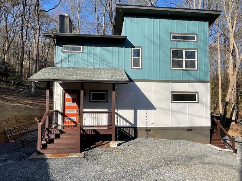 Exterior details and patio area of a home in , Ellijay (Image 15).
