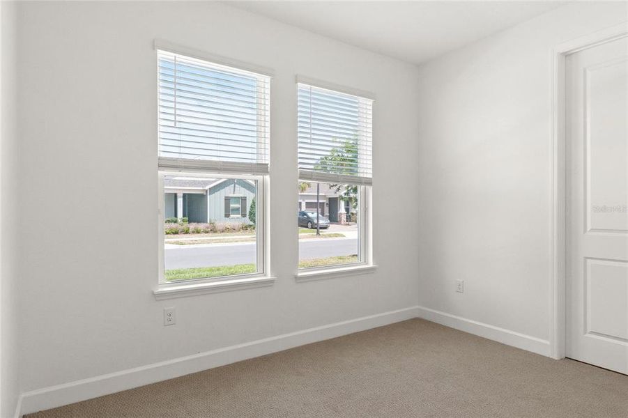 Spacious, unfurnished interior of a new home in Harvest at Ovation, Winter Garden (Image 21).
