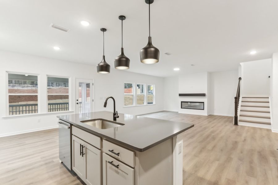 Representative furnished interior of a home built from the Alexis by Ashton Woods in Rowland's Grant, Fuquay Varina (Image 28).