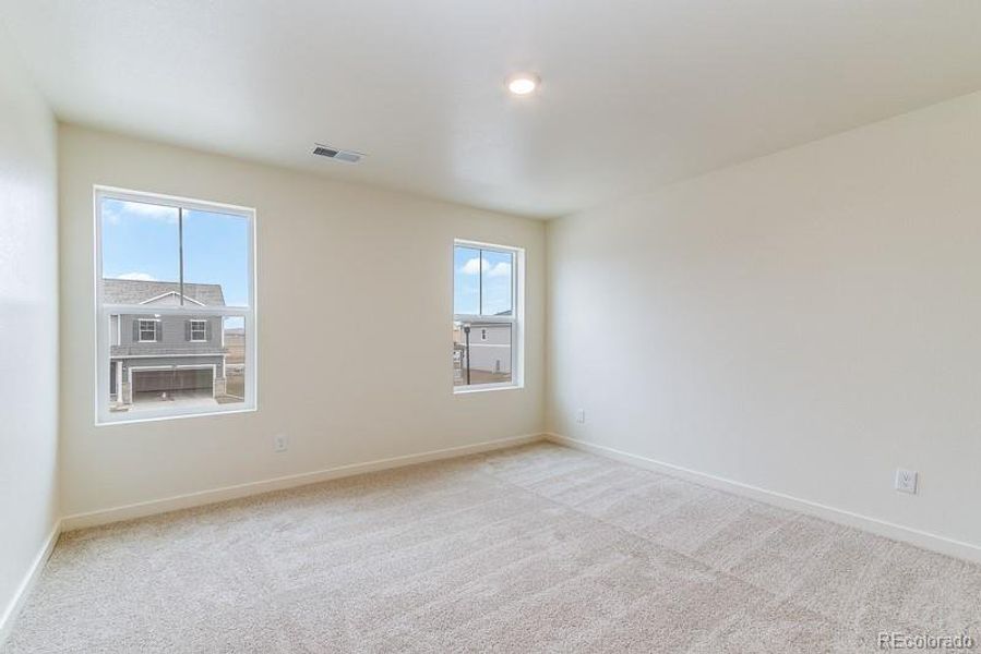 Spacious, unfurnished interior of a new home in Sky Ranch, Watkins (Image 17).