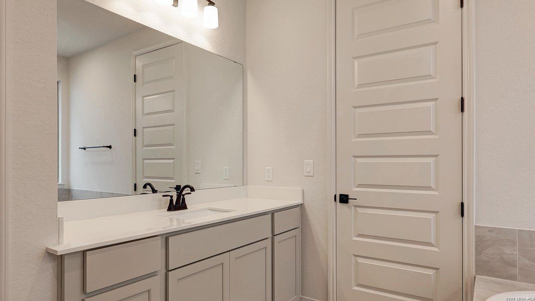 Furnished interior view inside a new home in VIDA, San Antonio (Image 8).