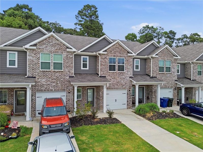 Front exterior of a new home in , Oakwood, GA, highlighting curb appeal (Image 2). Front exterior of a new home in , Oakwood, GA, highlighting curb appeal (Image 2).