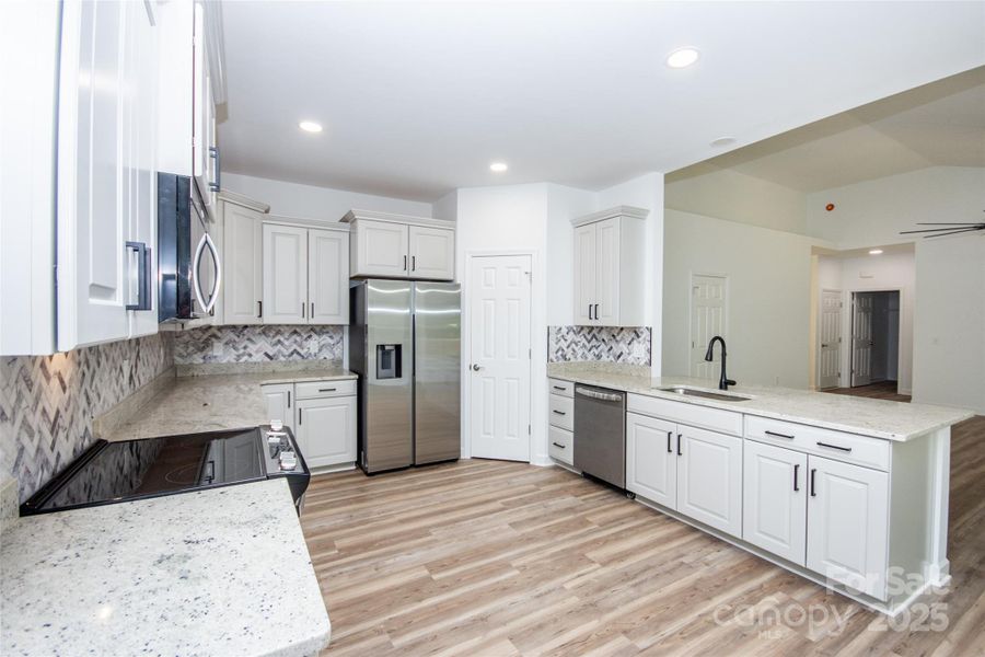 Furnished interior view inside a new home in , Statesville (Image 13).