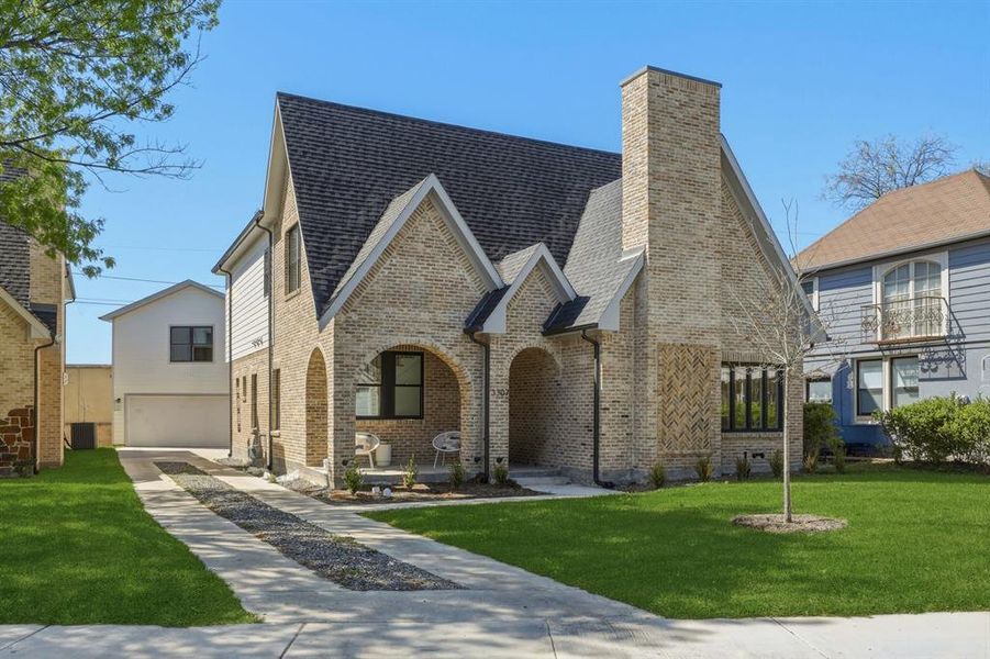 Front exterior of a new home in , Dallas, TX, highlighting curb appeal (Image 1). Front exterior of a new home in , Dallas, TX, highlighting curb appeal (Image 1).