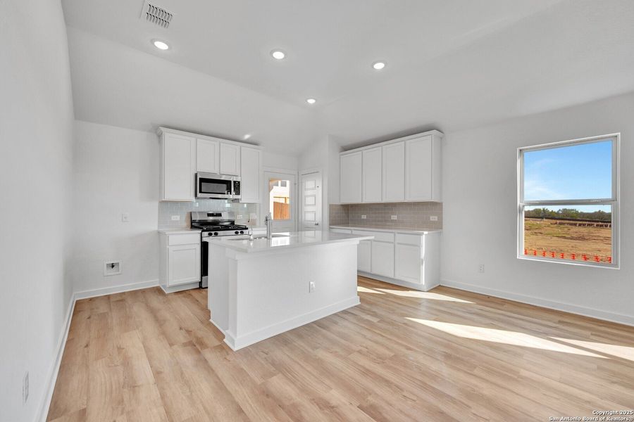 Furnished interior view inside a new home in Mesquite Ridge, San Antonio (Image 6).