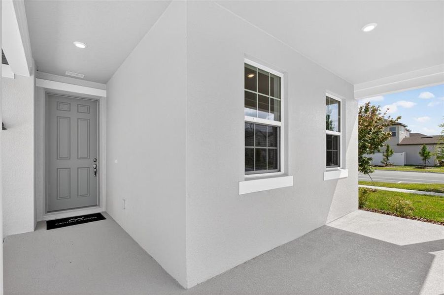 Exterior details and patio area of a home in Sunbrooke, St. Cloud (Image 24).