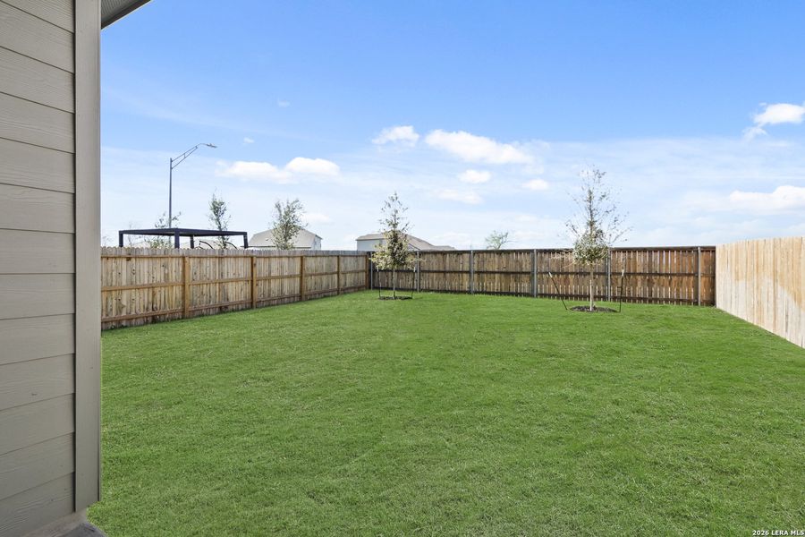 Exterior details and patio area of a home in Blue Ridge Ranch, San Antonio (Image 21).