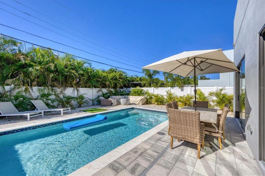 Exterior details and patio area of a home in , Sarasota (Image 18).