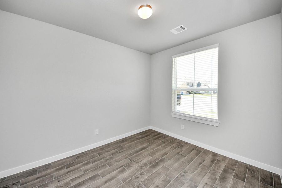 Step into the inviting home office, where elegant tile flooring adds a touch of freshness and comfort to the workspace. Natural light pours through the window, creating an inspiring environment for productivity and focus. Step into the inviting home office, where elegant tile flooring adds a touch of freshness and comfort to the workspace. Natural light pours through the window, creating an inspiring environment for productivity and focus.