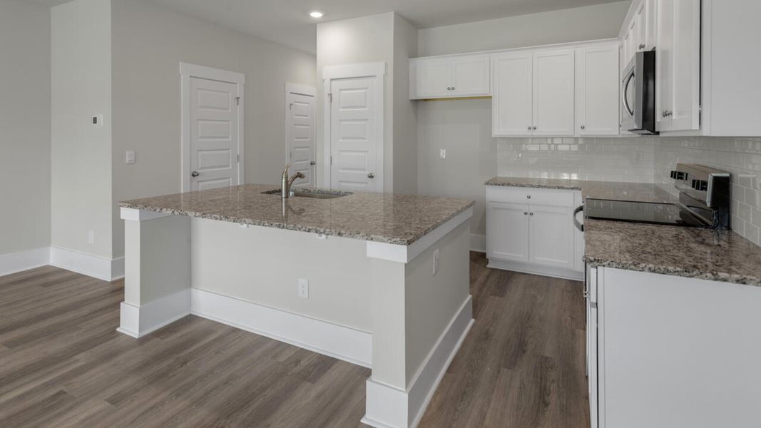 Furnished interior view inside a new home in Indigo Preserve Townhomes, Leland (Image 7).