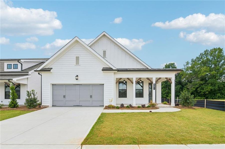 Front exterior of a new home in Aberdeen, Hoschton, GA, highlighting curb appeal (Image 23). Front exterior of a new home in Aberdeen, Hoschton, GA, highlighting curb appeal (Image 23).