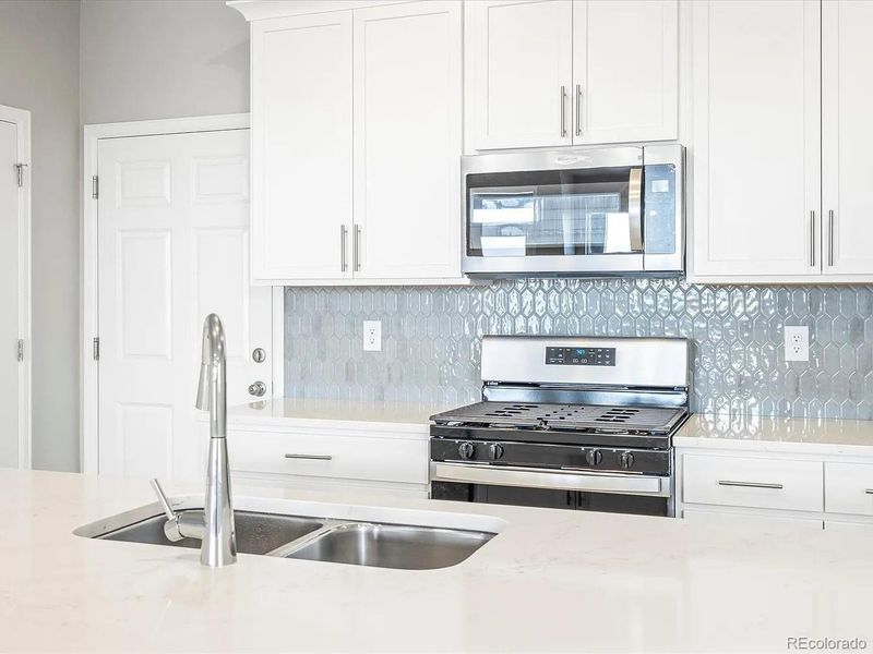 Furnished interior view inside a new home in Painted Prairie, Aurora (Image 7).