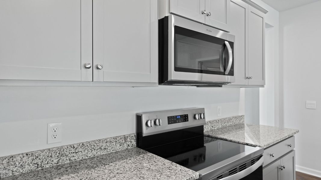 Representative furnished interior of a home built from the DARBY-EXP by D.R. Horton in Hillcrest, Ravenel (Image 9).