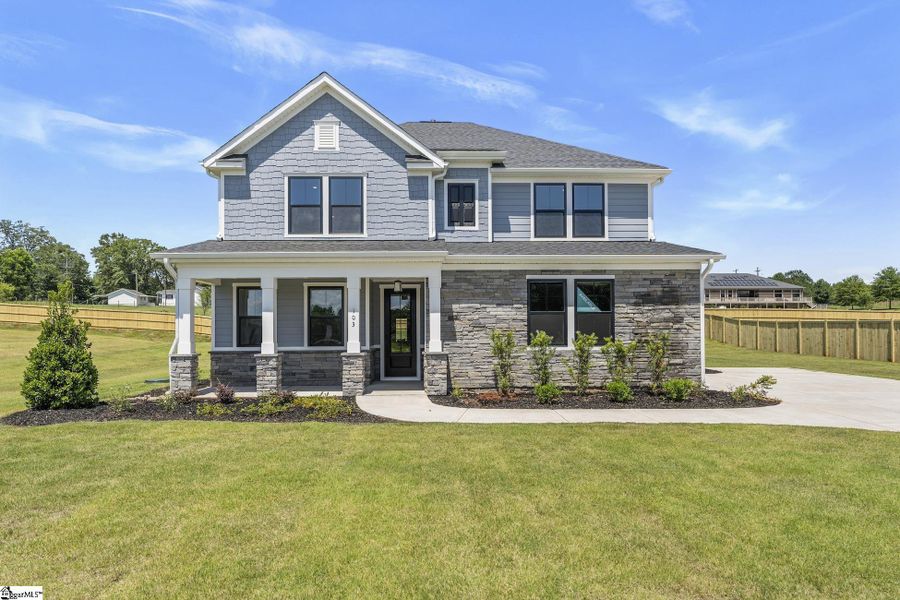 Front exterior of a new home in Double Springs, Taylors, SC, highlighting curb appeal (Image 2).