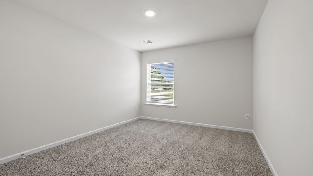 Spacious, unfurnished interior of a new home in Tanglewood Townes, Greenville (Image 25).