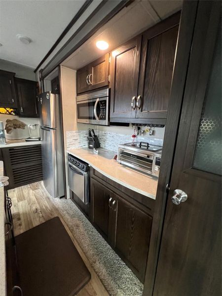 Furnished interior view inside a new home in , Okeechobee (Image 6).