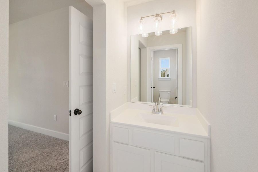 Furnished interior view inside a new home in Parmer Ranch - 60', Georgetown (Image 10).